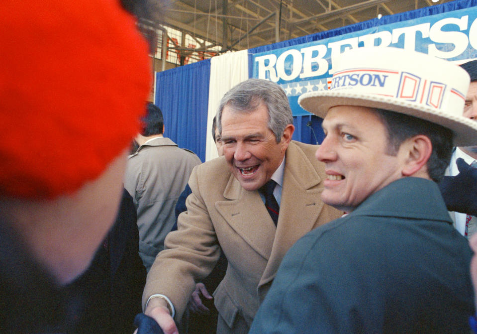 FILE - Republican presidential candidate Pat Robertson greets supporters in Louisville, Ky., on Feb. 25, 1988. Robertson died Thursday, June 8, 2023. (AP Photo/Mike Fisher, File)