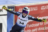 Norway's Ragnhild Mowinckel celebrates at the finish area of an alpine ski World Championships giant slalom, in Meribel, France, Thursday, Feb. 16, 2023. (AP Photo/Marco Trovati)