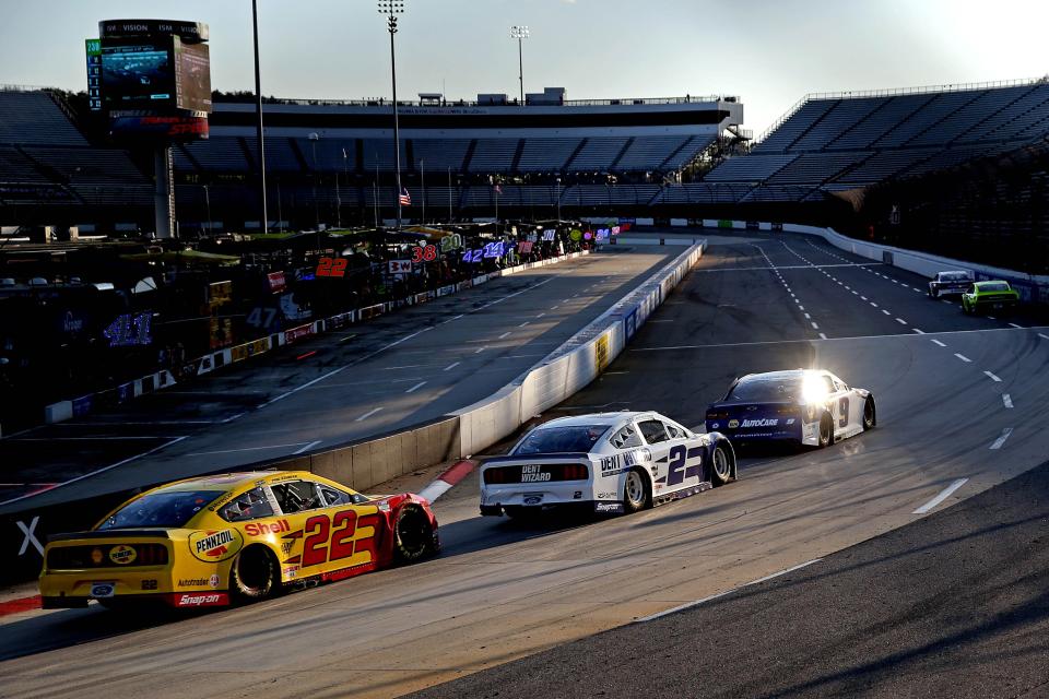 Chase Elliott (9) leads  Joey Logano (22) and Brad Keselowski (2) during the 2020 playoff race at Martinsville Speedway.