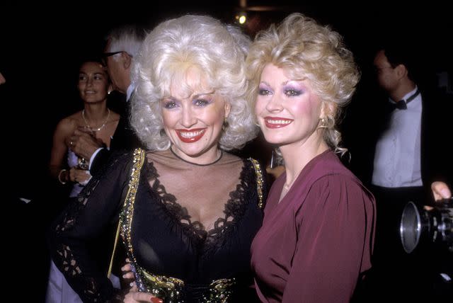 <p>Ron Galella/Getty Images</p> Dolly Parton and her youngest sister Rachel teamed up on a cookbook