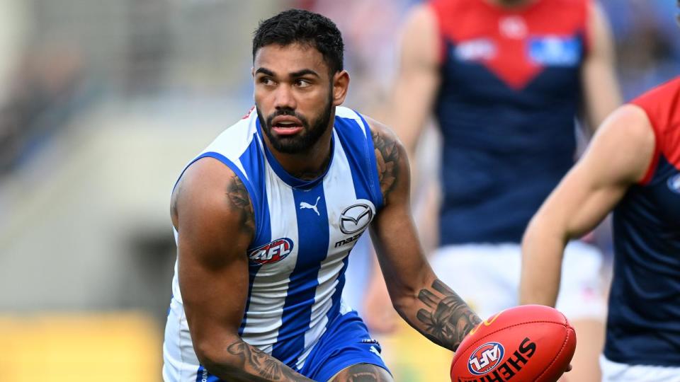 AFL coaches and peak violence education body Our Watch are hesitant to close the door on a return to football for disgraced North Melbourne player Tarryn Thomas. Picture: Steve Bell / Getty Images