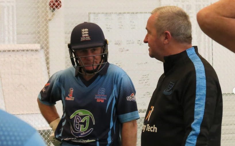 Richard Merriman, England over 60's cricket captain listens to coach Paul Farbrace at Loughbrough