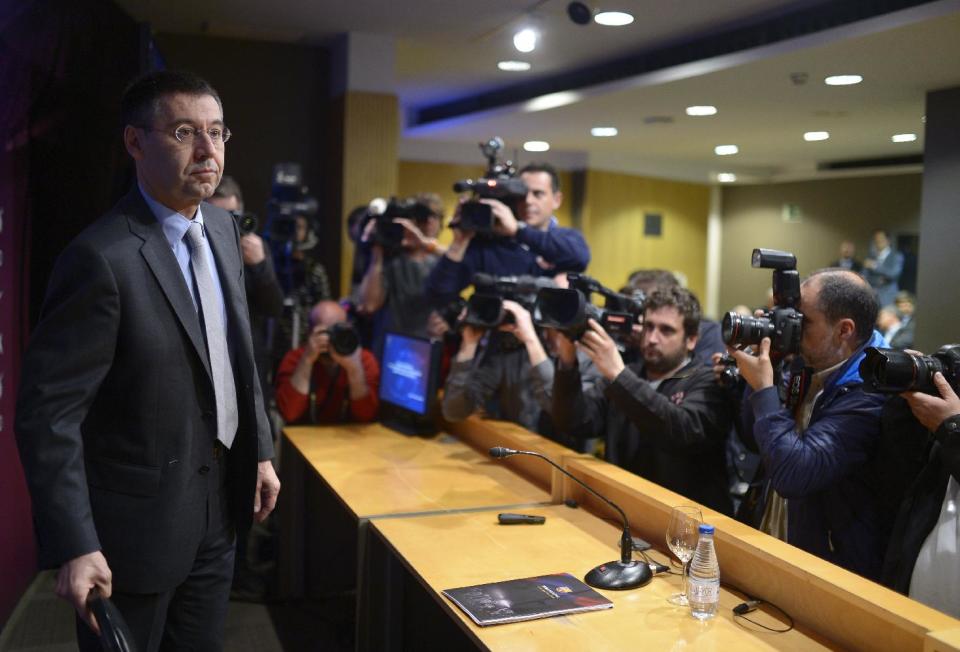 FC Barcelona's president Josep Maria Bartomeu attends a press conference at the Camp Nou stadium in Barcelona, Spain, Thursday, April 3, 2014. Barcelona has been "the victim of a grave injustice" after being hit with a FIFA transfer ban, he said on Thursday as the Spanish champion vowed not to change its model for recruiting youth players. Josep Maria Bartomeu told a news conference the club has never broken any Spanish regulations in signing young talents to its famed La Masia academy, which has produced such players as Lionel Messi, Xavi Hernandez, and Andres Iniesta. (AP Photo/Manu Fernandez)