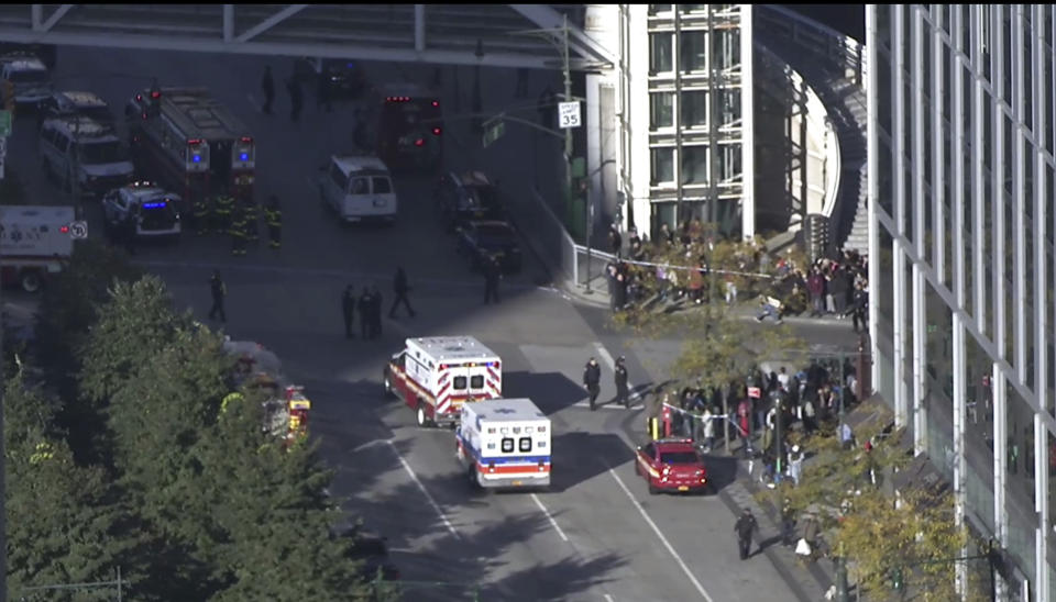 <p>In this still image taken from video, police and ambulances respond to report of gunfire a few blocks from the World Trade Center in New York on Oct. 31, 2017. (AP Photo) </p>