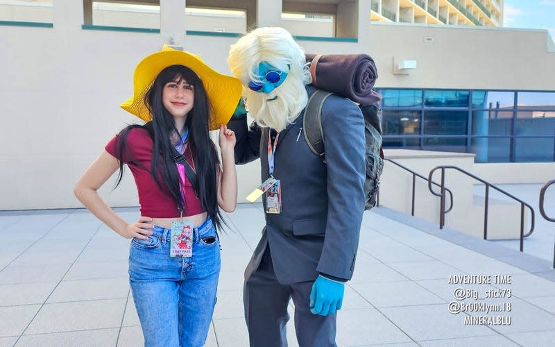 Marceline and Simon cosplayers striek a pose.