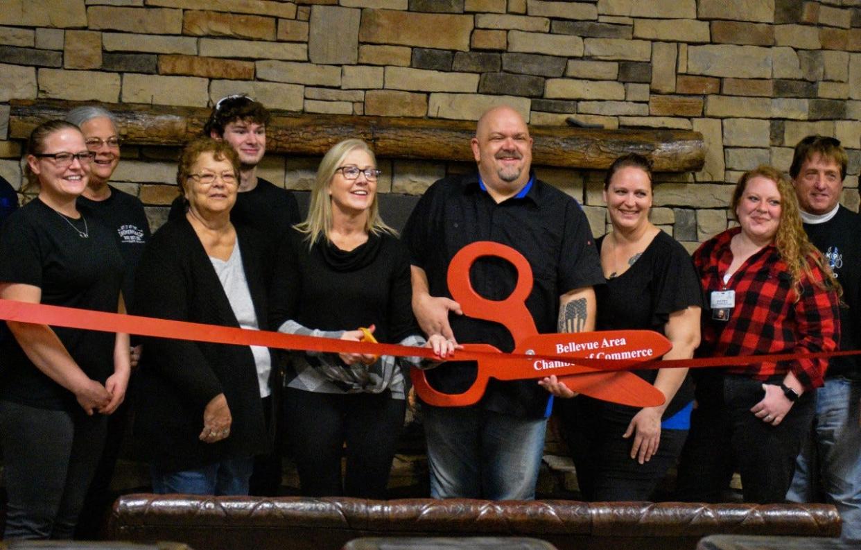 The Bellevue Area Chamber of Commerce hosted a ribbon cutting ceremony at The Vue Banquet & Event Center on Nov. 12. The Vue owners Lavin and Tom Schwan, holding the scissors, are excited to offer rental and event space for local residents.