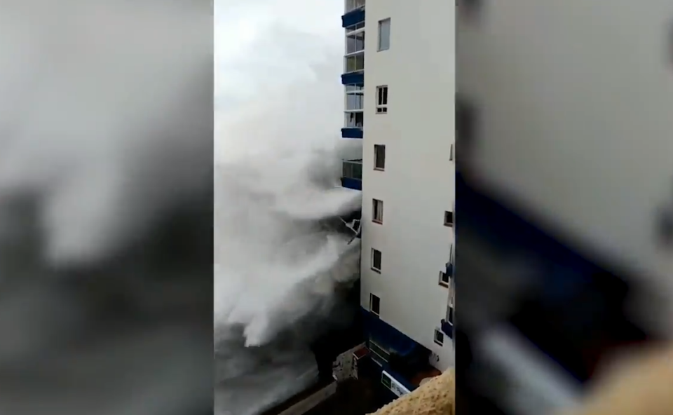 Spain weather: storm hits apartment block in Tenerife as flooding and heavy rain affects Mediterranean coast