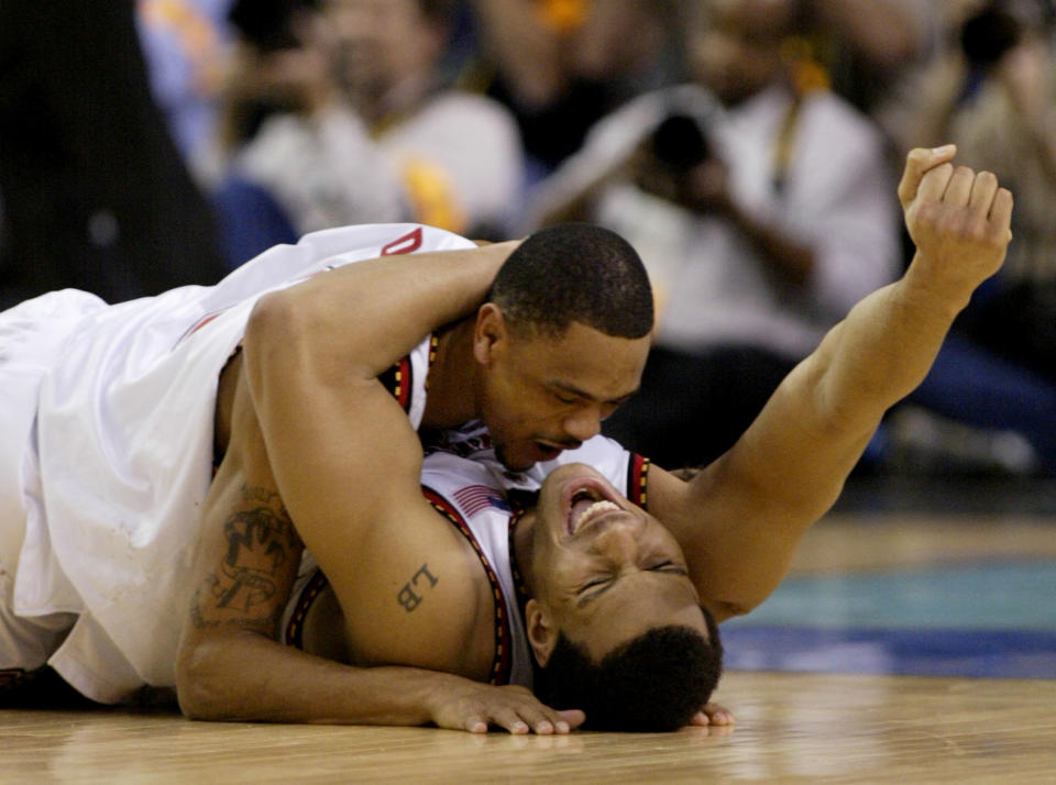 CAPTION CORRECTION CORRECT SPELLING OF BASKETBALL University of
Maryland players Lonny Baxter (below) and Juan Dixon fall to the floor
as they celebrate their 64-52 win over Indiana University in their
men's NCAA basketball championship game April 1, 2002 in Atlanta. This
is the first NCAA men's basketball championship for Maryland.
REUTERS/Peter Jones

JLS