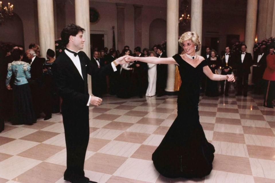 From left: John Travolta and Princess Diana at the White House dinner | AP/REX/Shutterstock