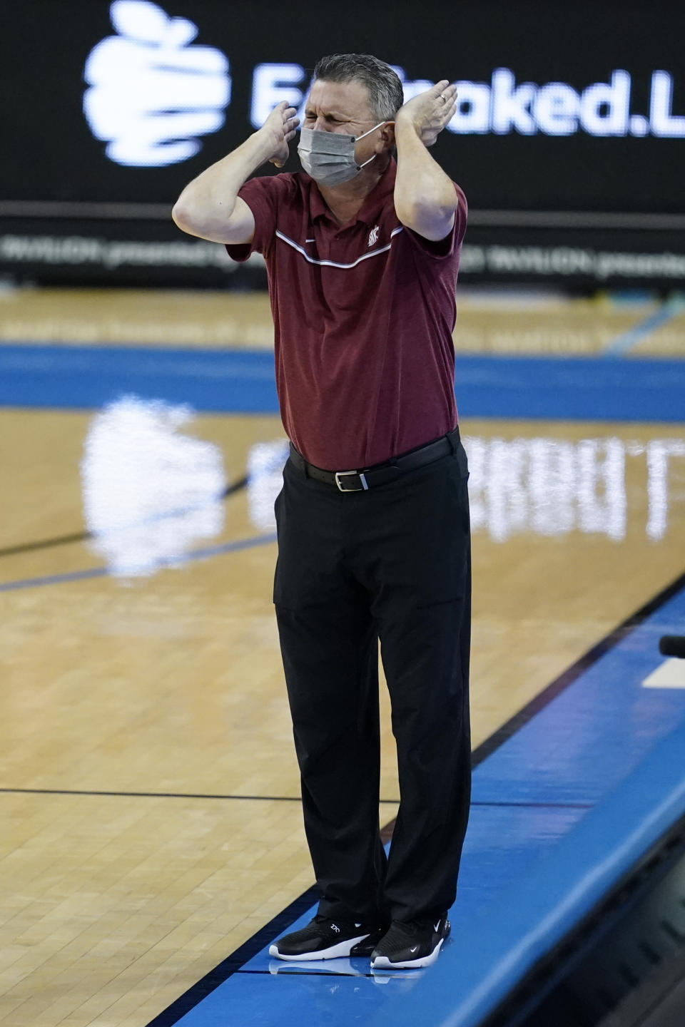 Washington State head coach Kyle Smith yells from the sideline during the first half of an NCAA college basketball game against UCLA, Thursday, Jan. 14, 2021, in Los Angeles. (AP Photo/Ashley Landis)