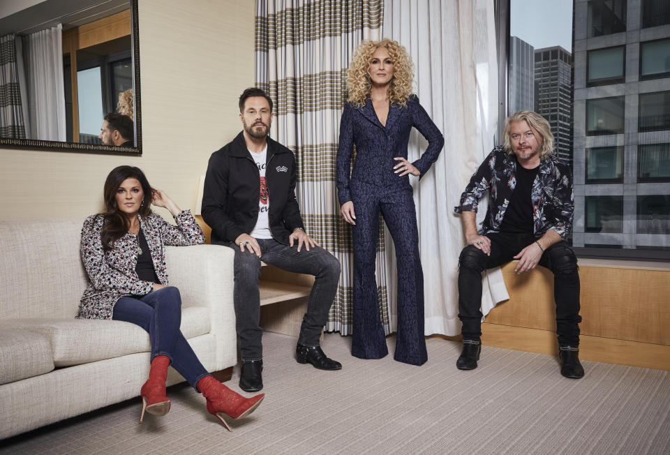 This Jan. 13, 2020 photo shows members of the country group Little Big Town, from left, Karen Fairchild, Jimi Westbrook, Kimberly Schlapman and Phillip Sweet posing for a portrait in New York to promote their new album "Nightfall," out on Friday. (Photo by Matt Licari/Invision/AP)