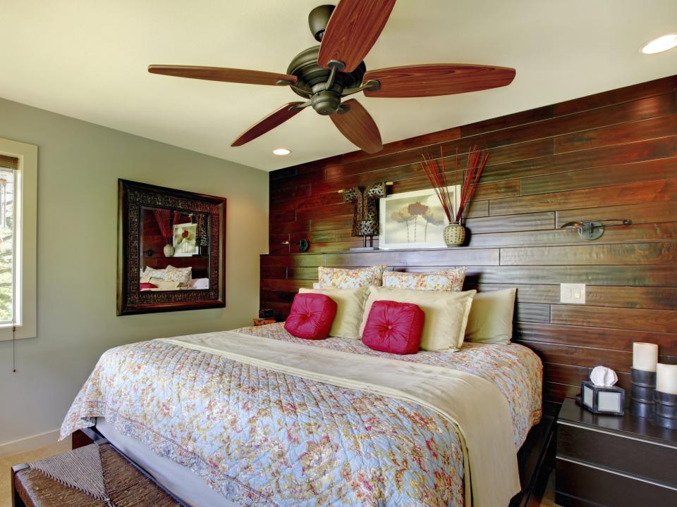 wood accent wall bedroom ceiling fan plant