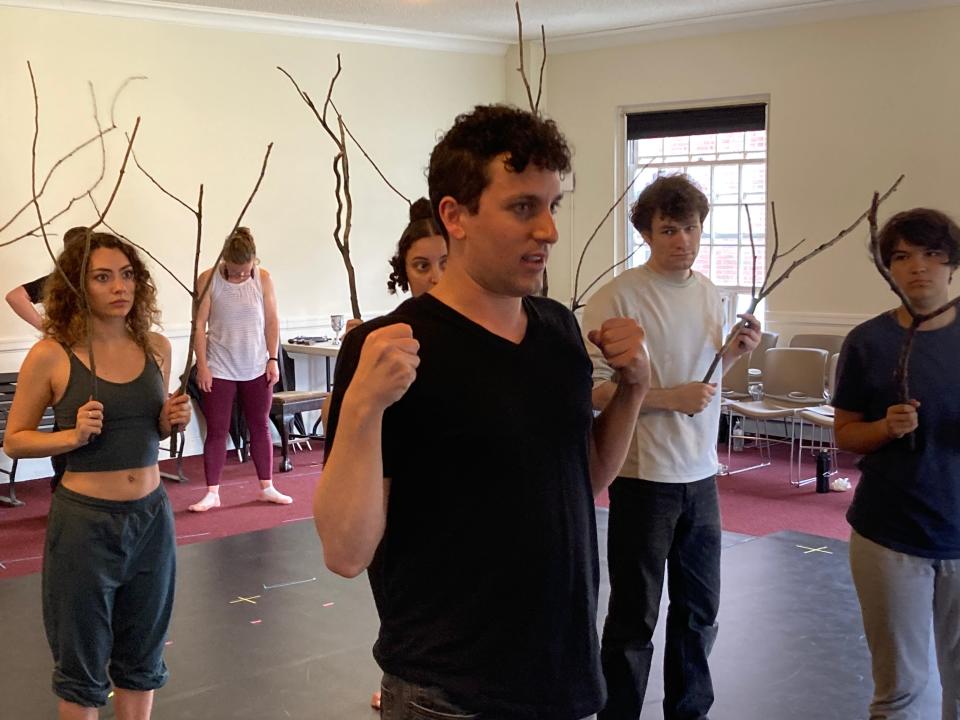 Eric Love, director of "The Addams Family" musical for Lost Nation Theater, demonstrates choreography for cast members July 20, 2023 during rehearsals for on the campus of the Vermont College of Fine Arts in Montpelier.