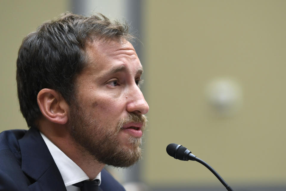 JUUL Labs co-founder and Chief Product Officer James Monsees testifies before a House Oversight and Government Reform subcommittee on Capitol Hill in Washington, Thursday, July 25, 2019, during a hearing on the youth nicotine epidemic. (AP Photo/Susan Walsh)