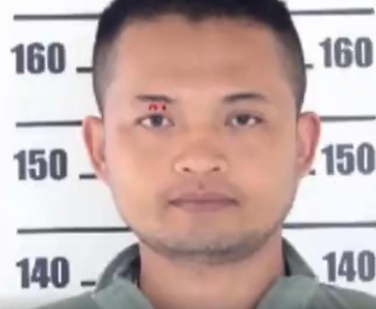In this mug shot released by the Nong Bua Lamphu Provincial Public Relations Office, a suspected assailant is shown in the attack in the town of Nongbua Lamphu, northern Thailand, Oct. 6, 2022.