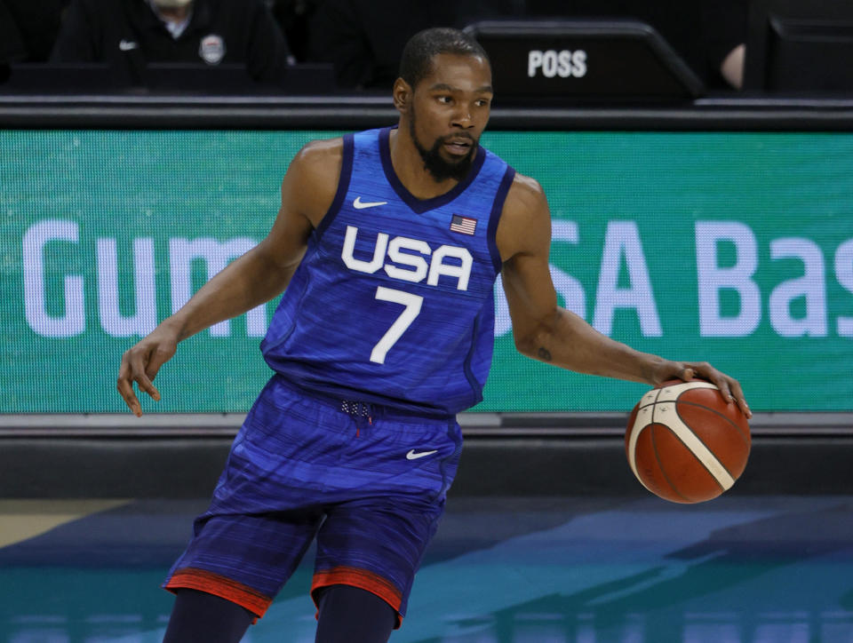 LAS VEGAS, NEVADA - JULY 12:  Kevin Durant #7 of the United States brings the ball up the court against the the Australia Boomers during an exhibition game at Michelob Ultra Arena ahead of the Tokyo Olympic Games on July 12, 2021 in Las Vegas, Nevada. Australia defeated the United States 91-83.  (Photo by Ethan Miller/Getty Images)