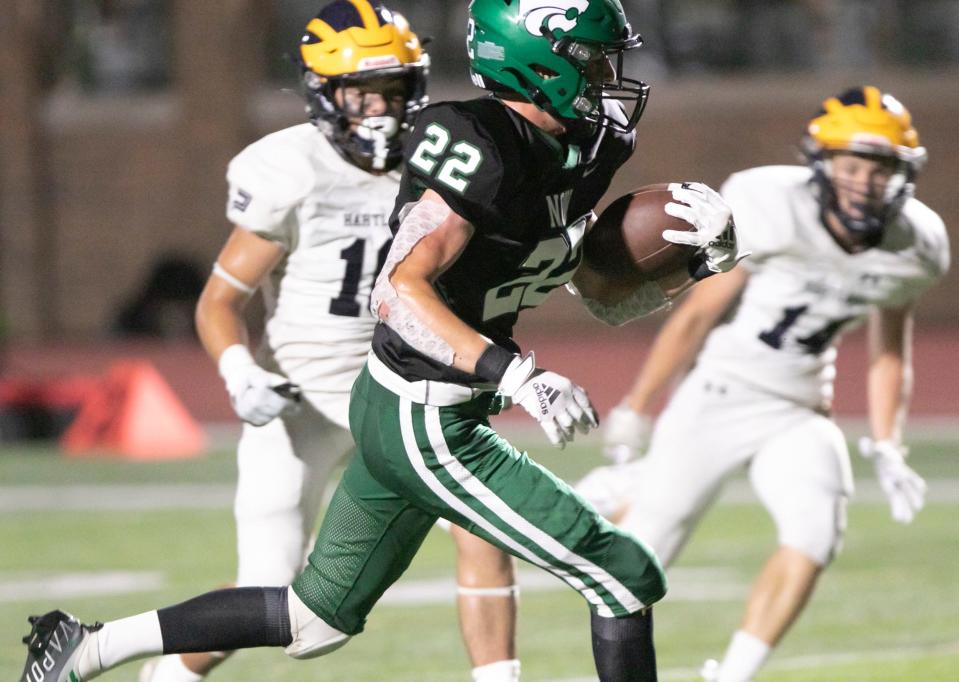 Boden Fernsler of Novi races to the end zone with the game-winning 19-yard touchdown catch in a 13-10 victory over Hartland on Thursday, Sept. 1, 2022.