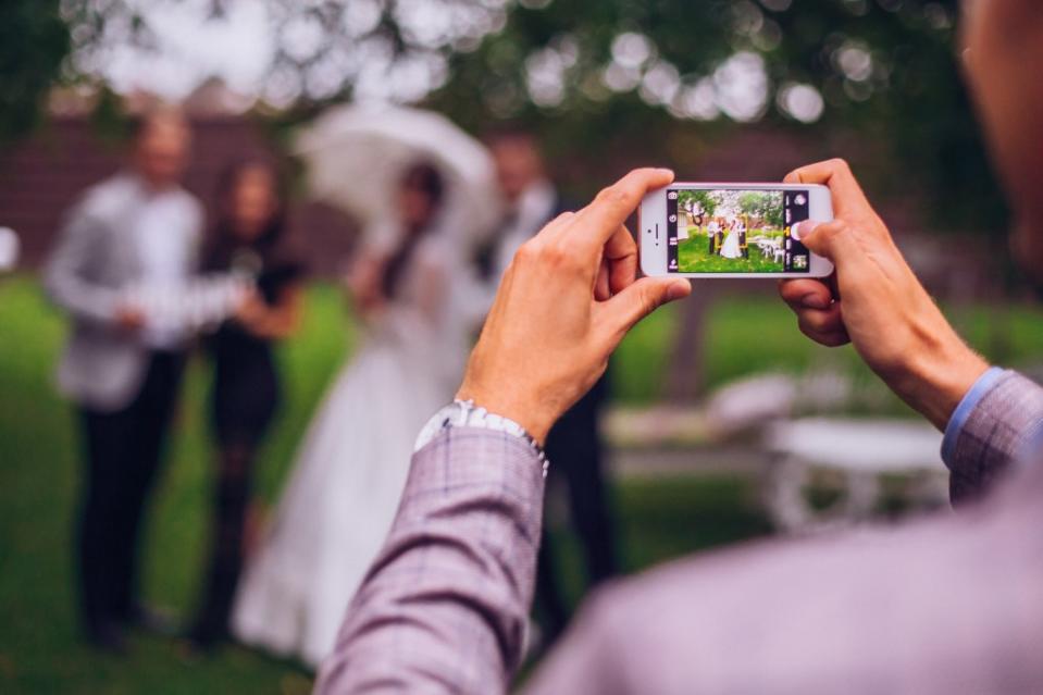 Boomers, a pair of newlyweds admitted, are the biggest offenders of disrupting the ceremony with photos. nataliakabliuk – stock.adobe.com