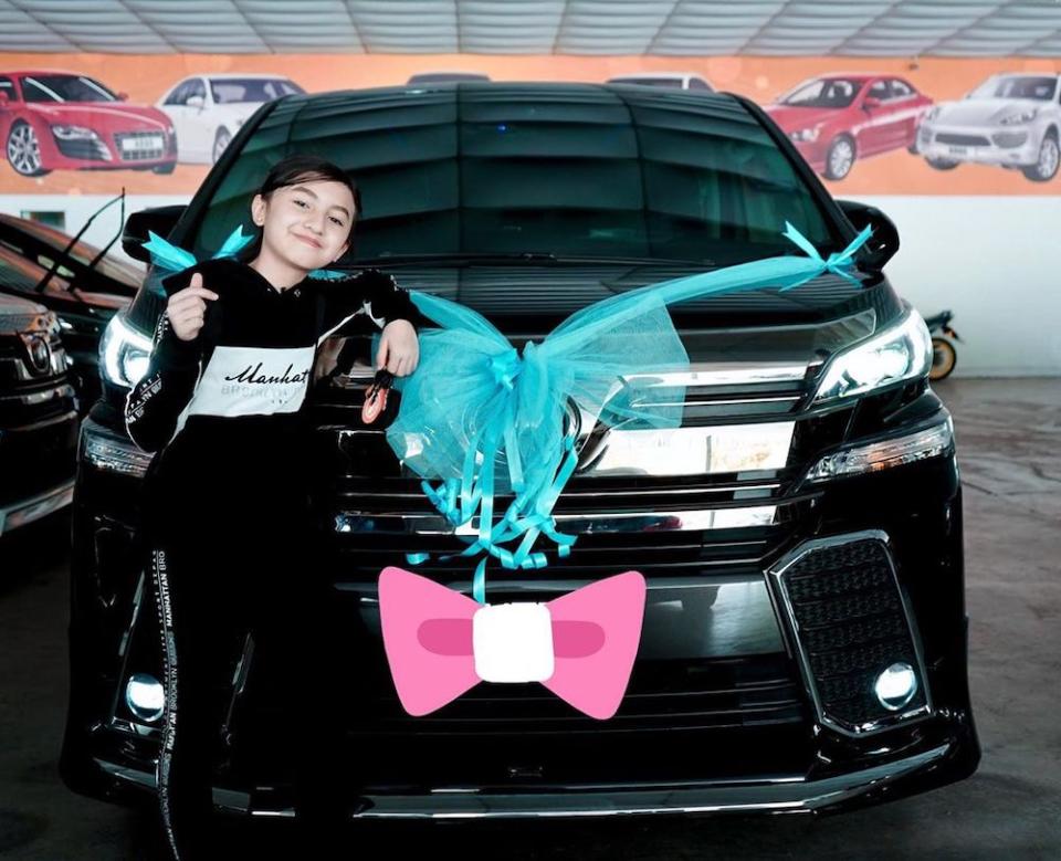 Singing sensation Alyssa Dezek poses with her new luxury MPV which costs more than RM250,000. — Picture from Instagram/Alyssa Dezek