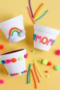 <p>A terra-cotta pot is a blank canvas for paint, pom-poms, and pipe cleaners. Spell out "mom" with pipe cleaners or go for something more abstract. Don't forget to fill it with a plant or fresh flowers once it's dry! </p><p><em><a href="https://designimprovised.com/2018/04/mothers-day-flower-pot-gift-craft-idea.html" rel="nofollow noopener" target="_blank" data-ylk="slk:Get the tutorial at Design Improvised »;elm:context_link;itc:0;sec:content-canvas" class="link ">Get the tutorial at Design Improvised »</a></em></p><p><strong>RELATED: </strong><a href="https://www.goodhousekeeping.com/holidays/mothers-day/g20115272/mothers-day-gifts-from-toddlers/" rel="nofollow noopener" target="_blank" data-ylk="slk:Sweet Mother's Day Gifts from Toddlers;elm:context_link;itc:0;sec:content-canvas" class="link ">Sweet Mother's Day Gifts from Toddlers</a></p>