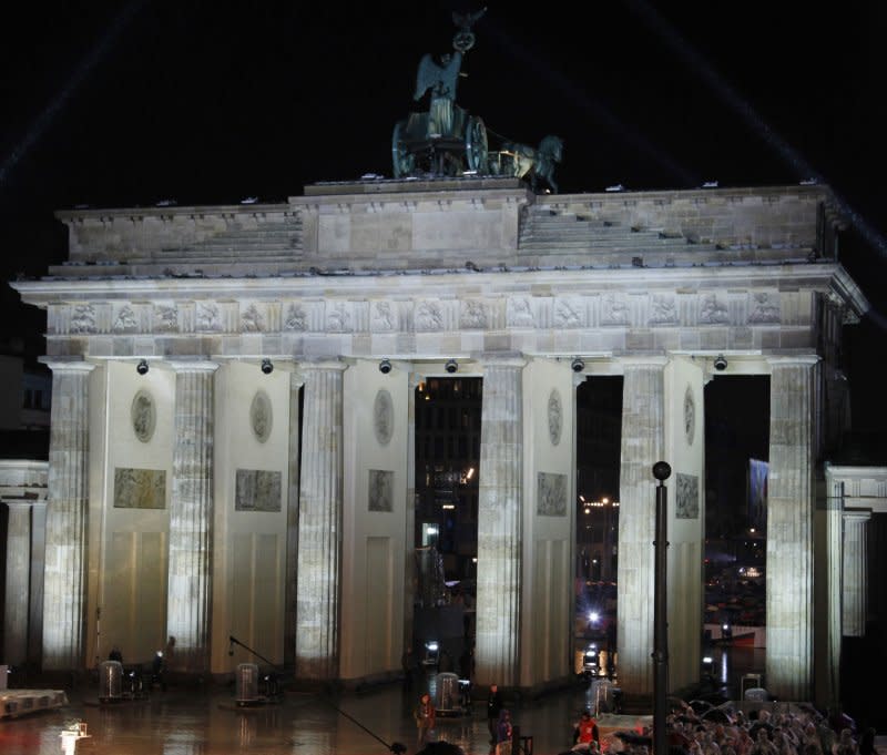 The Brandenburg Gate is seen before the start of a ceremony commemorating the 20th anniversary of the fall of the Wall in Berlin on November 9, 2009. On June 20, 1991, the German Parliament voted to move its capital from Bonn to Berlin. File Photo by David Silpa/UPI