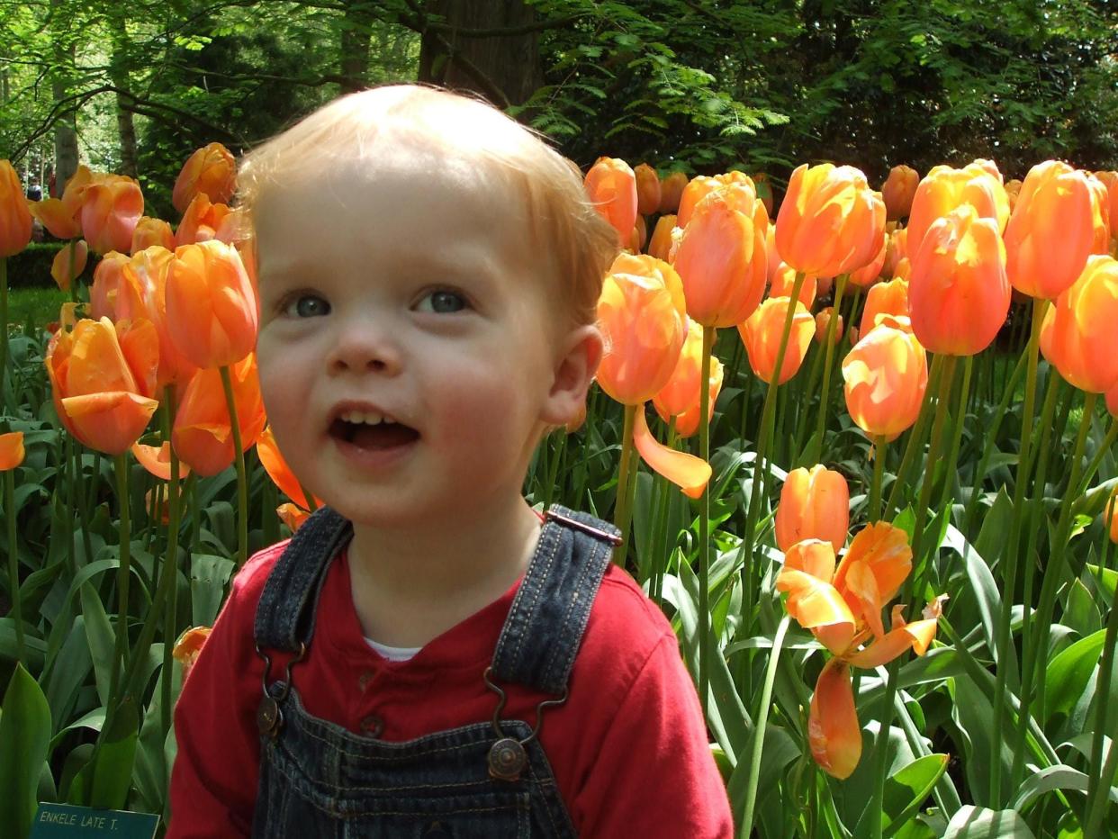 Tracy Brown's child posing for photo