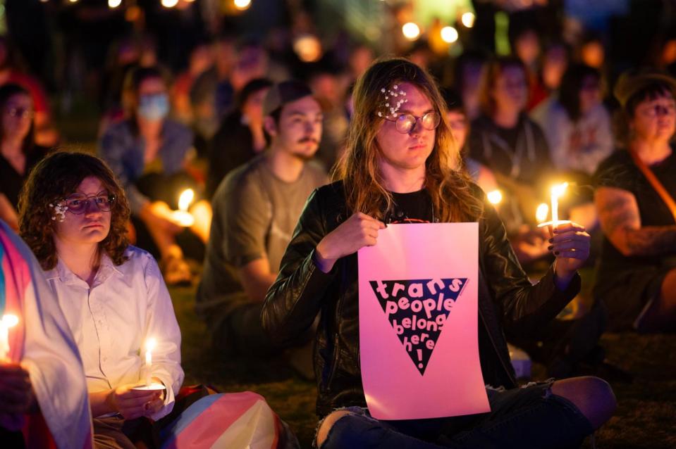PHOTO: People attend a candlelight vigil for 16-year-old nonbinary student Nex Benedict, Feb. 25, 2024, in Tulsa, Okla. (J Pat Carter/Getty Images)