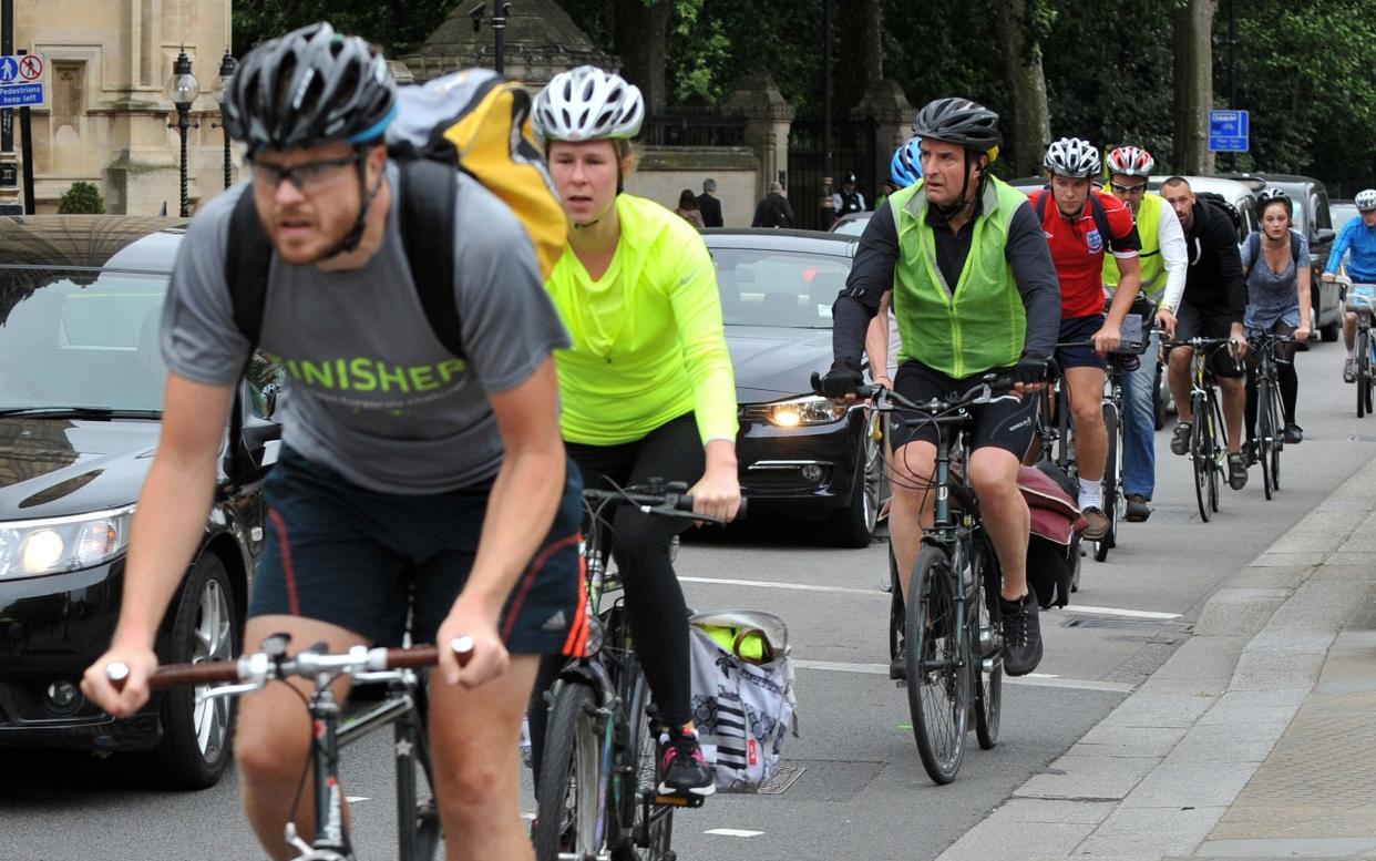 Cycling campaigners say they would strongly oppose any move to make helmets compulsory - PA