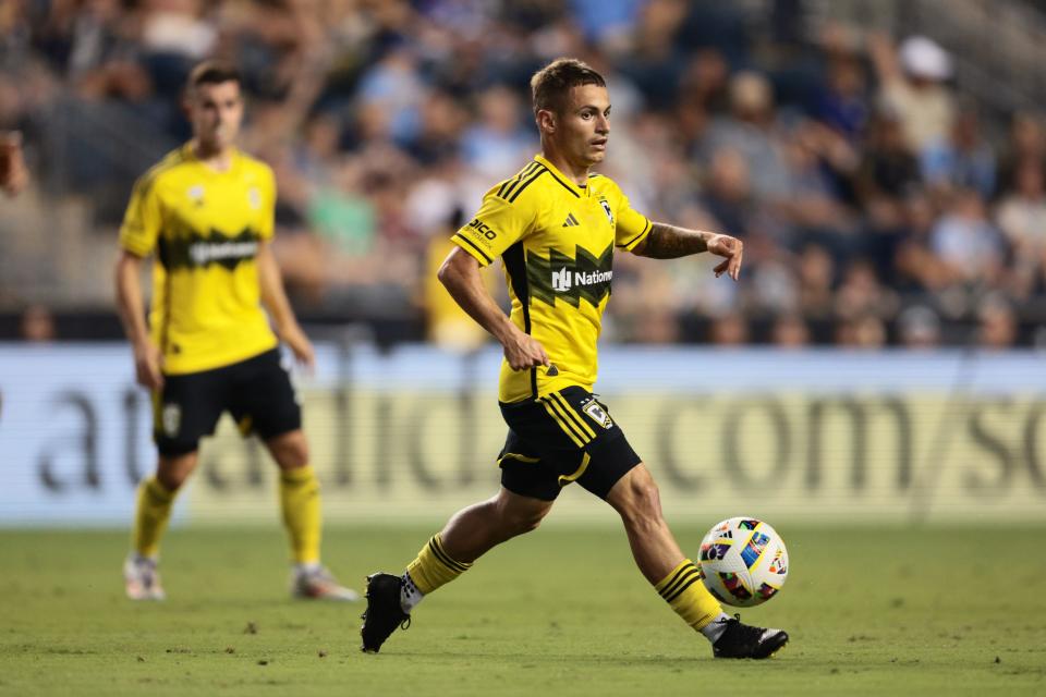 Aug 28, 2024; Philadelphia, Pennsylvania, USA; Columbus Crew midfielder Alexandru Matan (20) plays the ball in the first half against the Philadelphia Union at Subaru Park. Mandatory Credit: Caean Couto-USA TODAY Sports