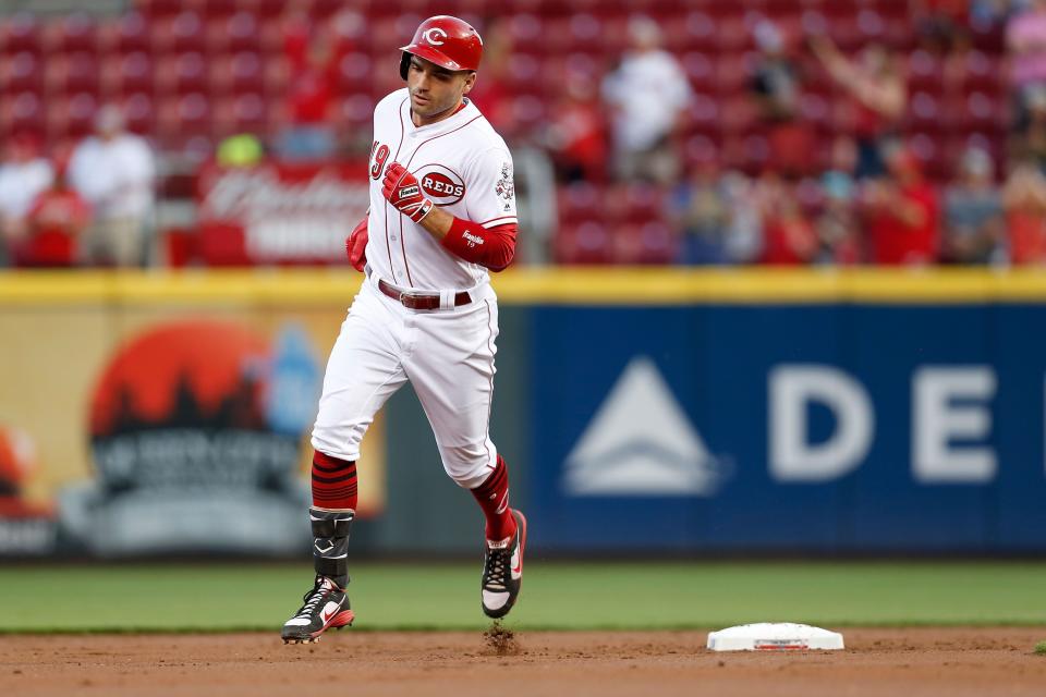 Joey Votto probably won’t win NL MVP but that doesn’t mean he’s not a better player than Giancarlo Stanton. (Getty Images)