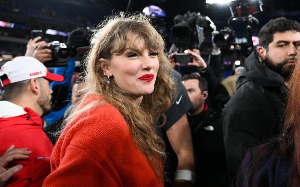 Taylor Swift walks off the field following the AFC Championship between the Kansas City Chiefs and the Baltimore Ravens at M&T Bank Stadium on January 28, 2024 in Baltimore, Maryland.