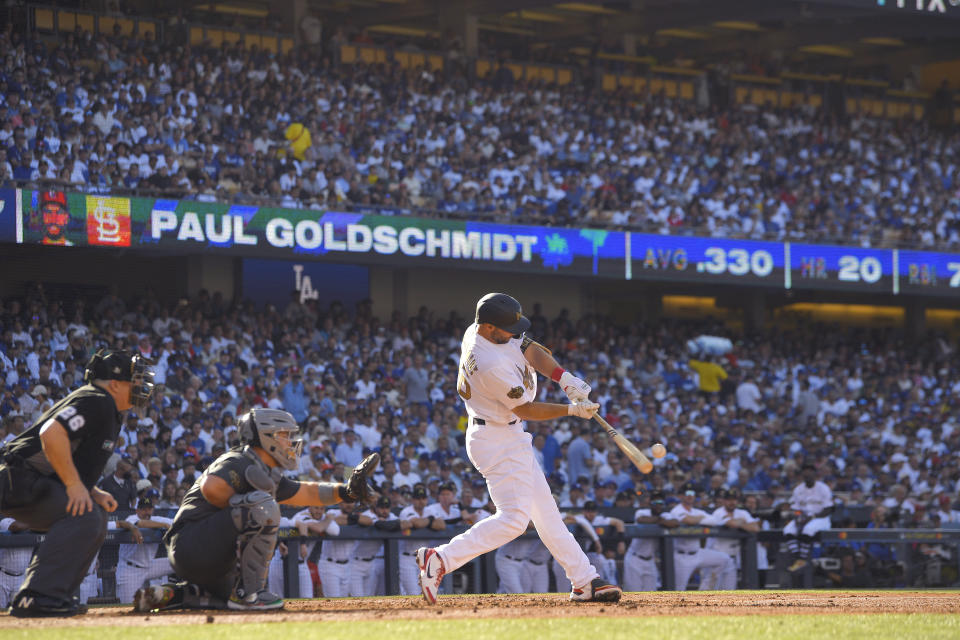 National League's Paul Goldschmidt, of the St. Louis Cardinals, connects for a solo home run off American League pitcher Shane McClanahan, of the Tampa Bay Rays, during the first inning of the MLB All-Star baseball game, Tuesday, July 19, 2022, in Los Angeles. (AP Photo/Mark J. Terrill)