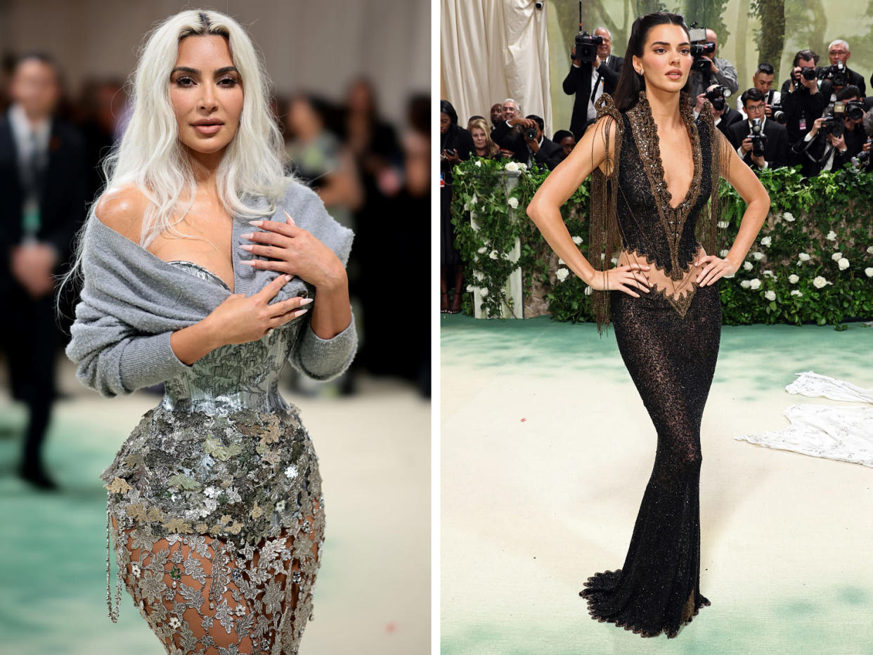 Kim Kardashian and Kendall Jenner attends The 2024 Met Gala Celebrating 