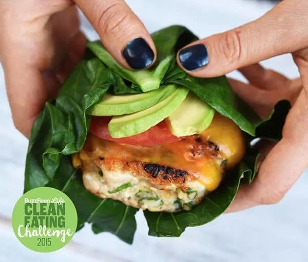 Person holding a Collard-Wrapped Turkey Burger