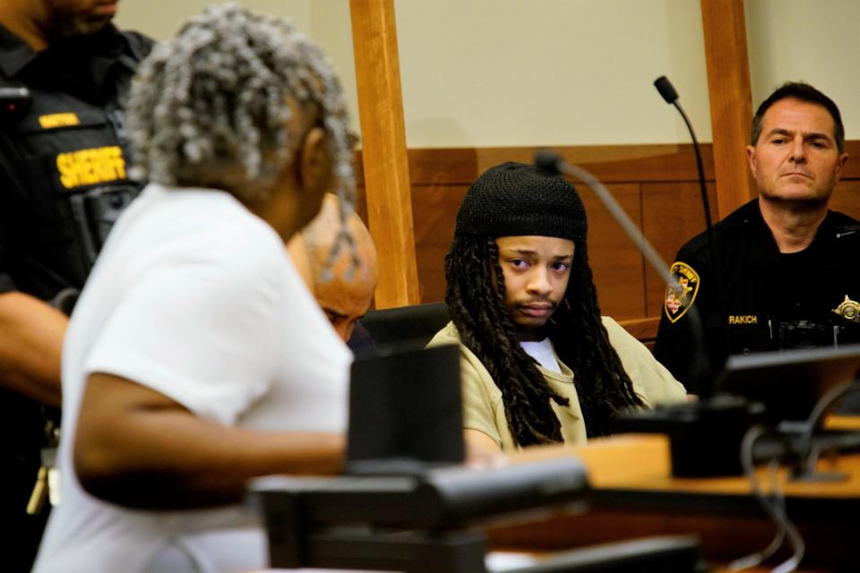 Wanda R. Bruce, Courtney Bruce's mother, speaks Monday in Franklin County Common Pleas Court to two of the three men who killed her daughter in 2021. She told Sincere McIntyre and Jumada Williams II, center, they get to live their lives but her daughter doesn't.