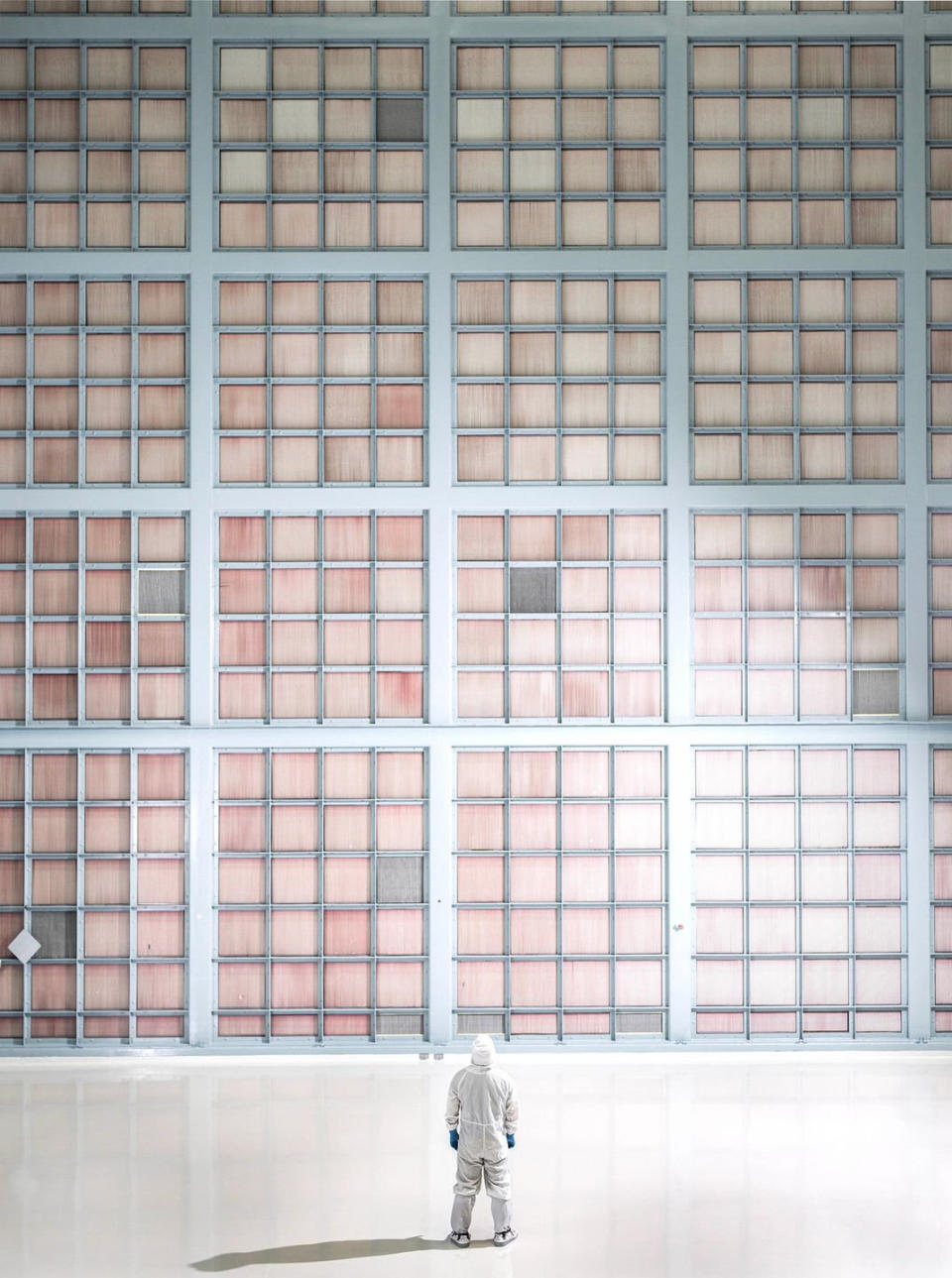 Winner, 'Places' category:  A lone person stands facing the wall of HEPA filters in the Goddard Space Flight Center