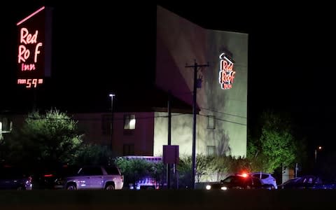 Officials work at the scene early Wednesday, March 21, 2018, in the Austin suburb of Round Rock - Credit: Eric Gay /AP