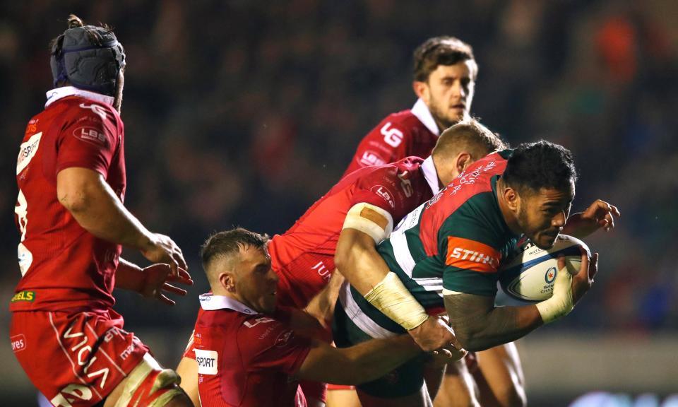 Manu Tuilagi, seen here dragging Scarlets’ Gareth Davies and Hadleigh Parkes along the Welford Road turf, was back to his best on Friday night.