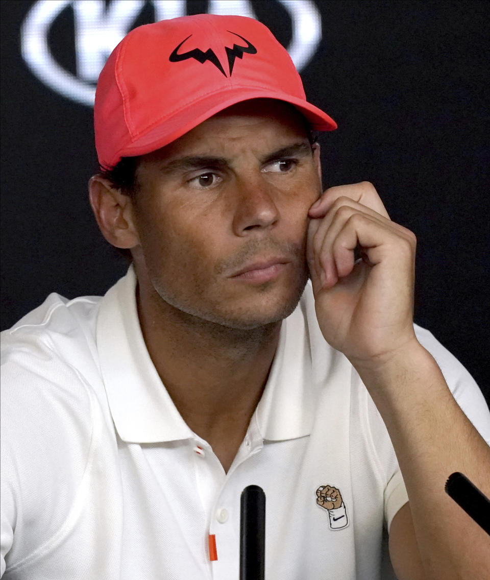 Spain's Rafael Nadal talks at a press conference following his quarterfinal loss to Austria's Dominic Thiem at the Australian Open tennis championship in Melbourne, Australia, Thursday, Jan. 30, 2020. (AP Photo/Lee Jin-man)