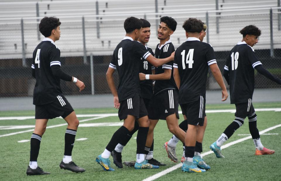 Pacifica High players celebrate a goal during the Tritons' 4-0 win over Oxnard in a Channel League match on Saturday, Jan. 20, 2024.