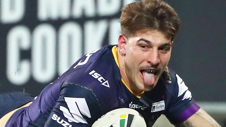 Curtis Scott, pictured scoring for the Melbourne Storm, has been arrested in Sydney.