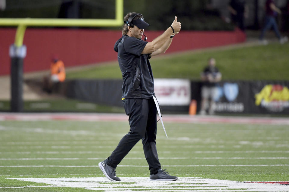 Coastal Carolina coach Jamey Chadwell reacts to a call during the first half of the team's NCAA college football game against Arkansas State on Thursday, Oct. 7, 2021, in Jonesboro, Ark. (AP Photo/Michael Woods)