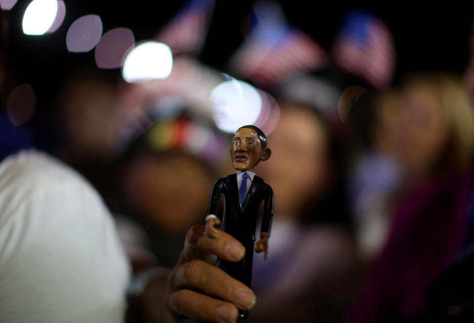 A supporter of U.S. President Barack Obama holds up a doll in his likeness during the Obama Election Night watch party at McCormick Place November 6, 2012 in Chicago, Illinois. Obama is going for reelection against Republican candidate, former Massachusetts Governor Mitt Romney. (Photo by Chip Somodevilla/Getty Images)