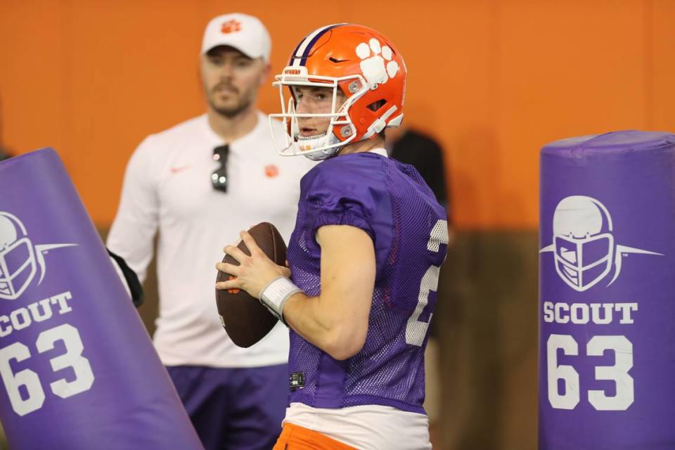 Clemson quarterback Cade Klubnik (2) and offensive coordinator Garrett Riley during the Tigers’ opening day of spring practice at the Allen N. Reeves Football Complex on March 6, 2023.