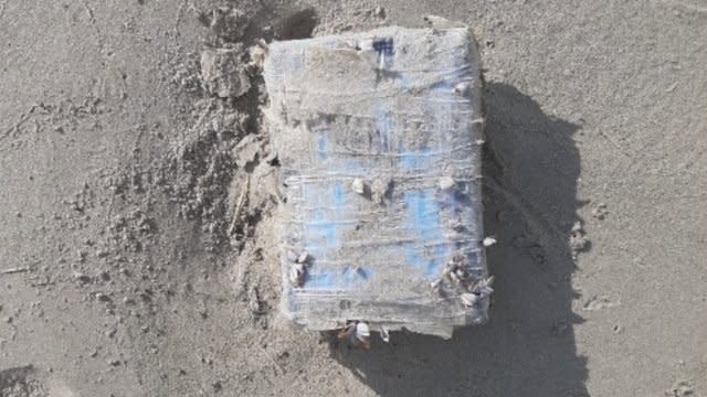 A brick of cocaine on a Texas beach.