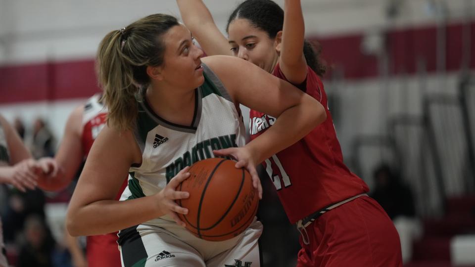 Samantha Vanbeekum of Hopatcong is guarded by Amaya Campbell of Boonton in the second half as Boonton topped Hopatcong 47-25 in the 2022 at Morris Hills 2022 Girls Basketball Tournament played at Morris Hills HS in Rockaway, NJ on December 27, 2022.