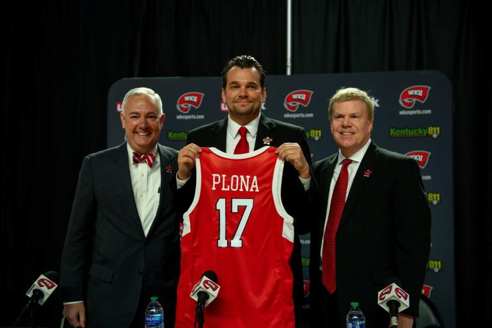 New Western Kentucky University men’s basketball coach Hank Plona, center, with WKU president Timothy C. Cabonie, left, and Hilltoppers athletics director Todd Stewart, right.