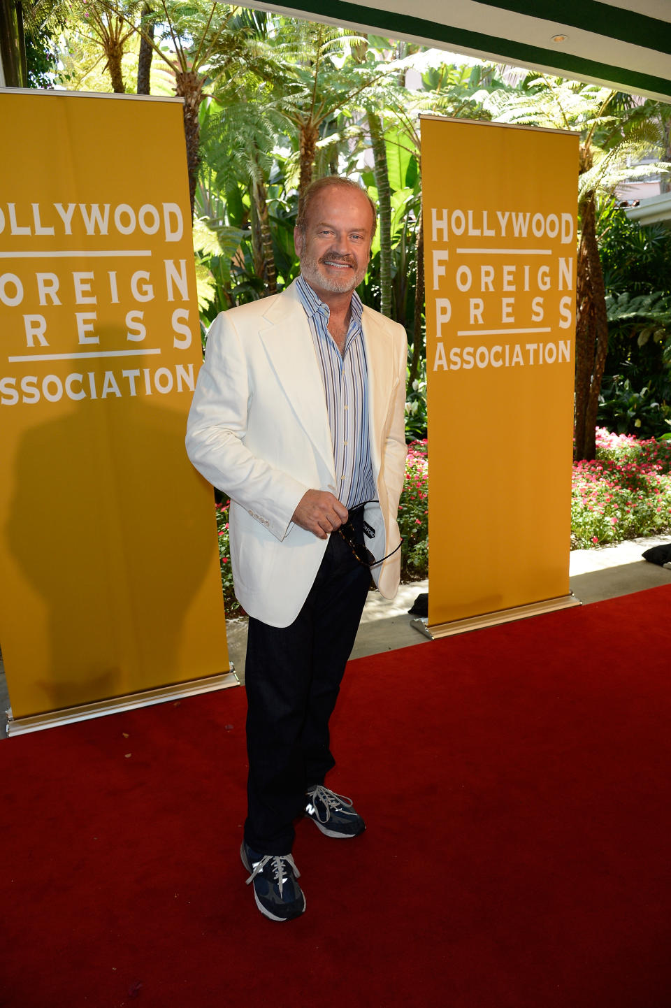 Kelsey Grammer arrives at the Hollywood Foreign Press Association's 2012 Installation Luncheon held at the Beverly Hills Hotel on August 9, 2012.