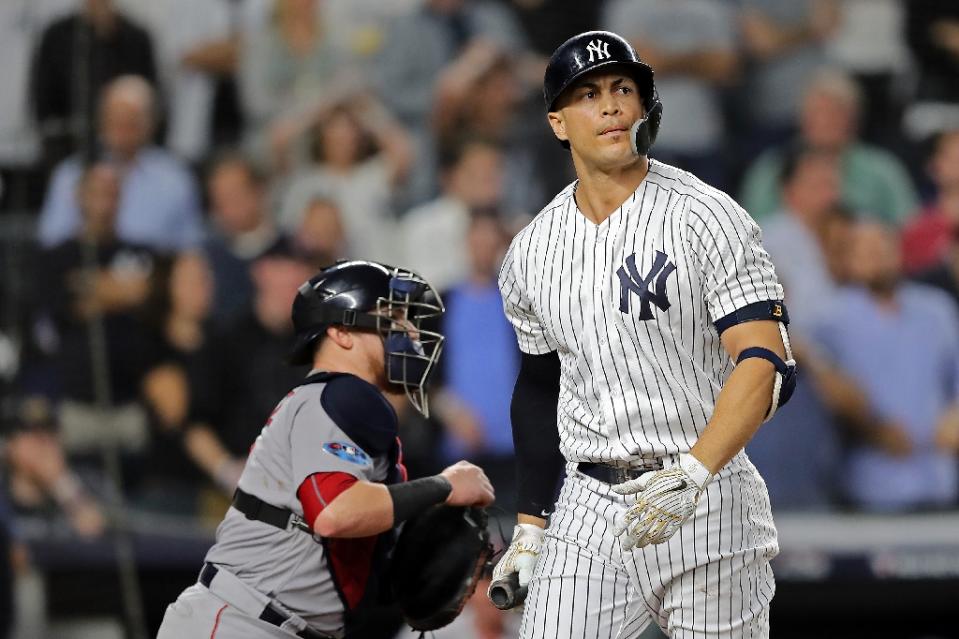 Giancarlo Stanton of the New York Yankees strikes out in the ninth inning against the Boston Red Sox (AFP Photo/ELSA)