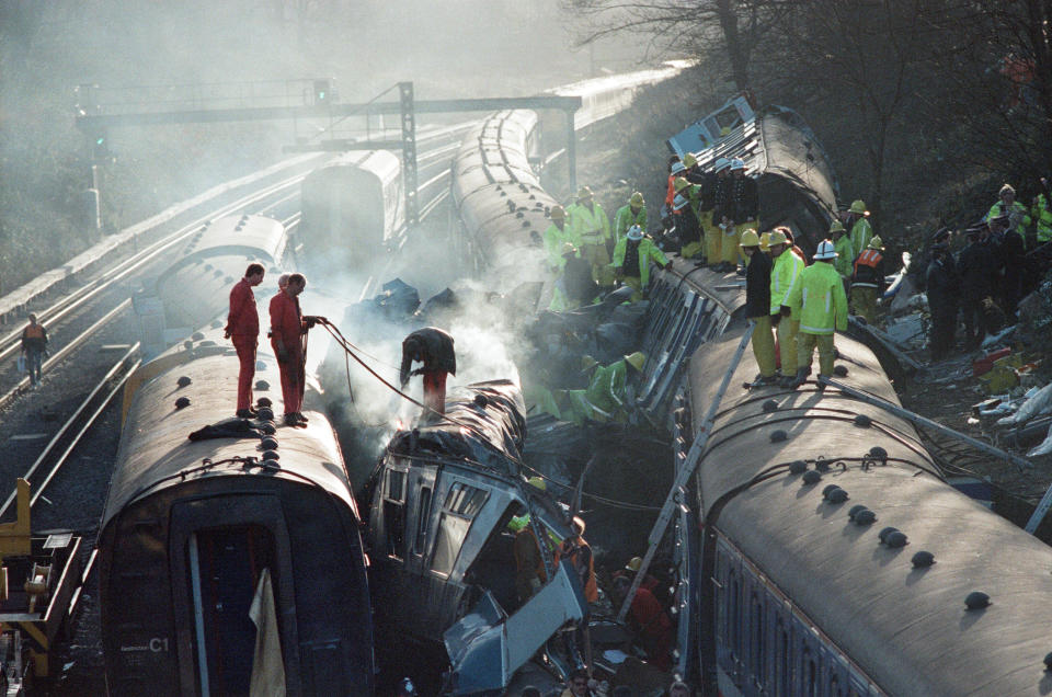 Clapham train crash On 12 December 1988 the 07:18 from Basingstoke to London Waterloo was approaching Clapham Junction when the driver saw the signal ahead of him change from green proceed to red danger. Unable to stop at the signal, he stopped his train at the next signal and then reported to the signal box by telephone. He was told there was nothing wrong with the signal. At this point the following train collided with the Basingstoke train. A third train, carrying no passengers was passing on the adjacent line in the other direction and hit the wreckage. The driver of a fourth train, coasting with no traction current, saw the other trains and managed to a stop. Thirty five people died and nearly five hundred were injured in the accident. Our Picture Shows: Firemen and engineers from network rail cutting through the wreckage of one of the three trains involved in the collision searching for survivors. (Photo by Staff/Mirrorpix/Getty Images)